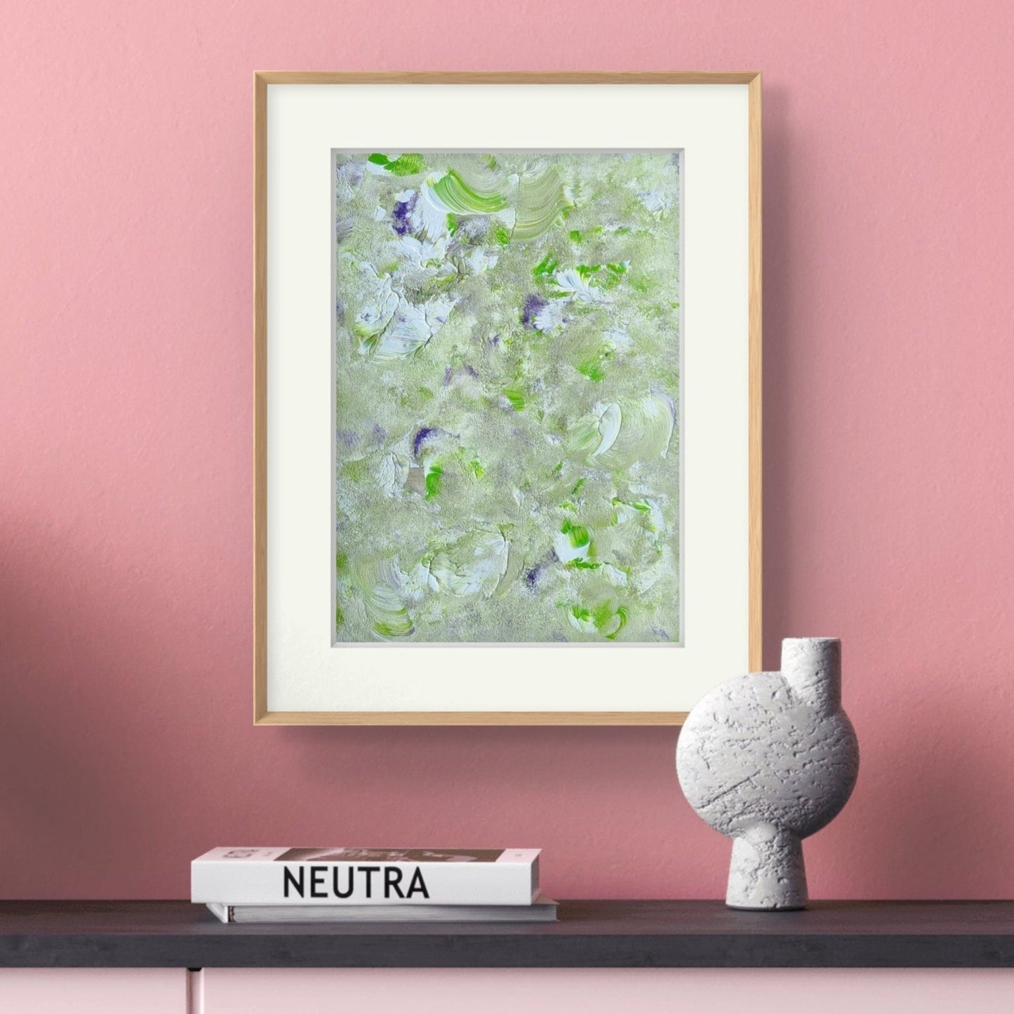 Original one of a kind colorful abstract acrylic art piece in green, purple and white, hanging vertically and created by up-and-coming artist Jeanette Haga as decor for modern homes
