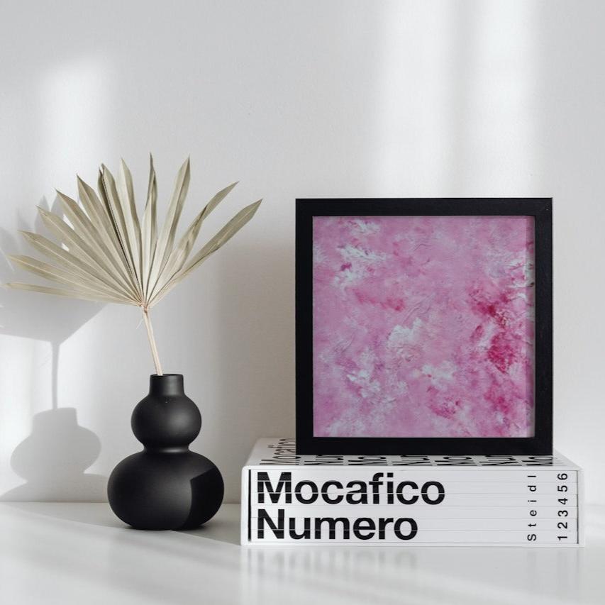 Vibrant Red and white Feel good one of one-of-a-kind colorful art poster based on original abstract art created by up-and-coming artist Scandinavian Jeanette Haga as decor in a modern home against a white wall