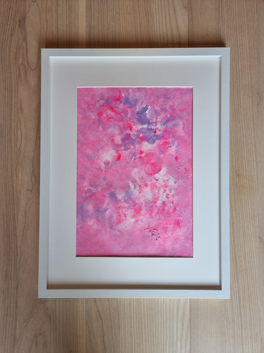 Pink, purple and white abstract original acrylic painting with a white frame and a white passepartout hanging vertically on a light oak wall
