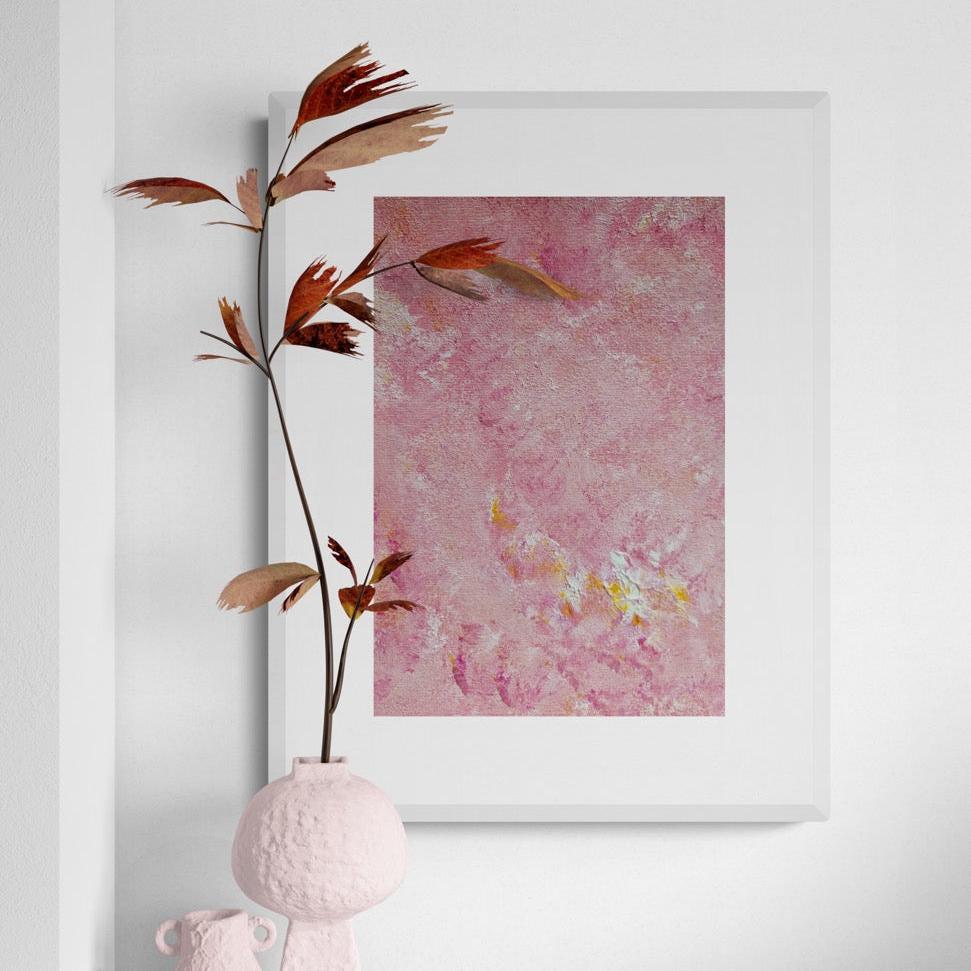 Bright pink and yellow Feel good one of one-of-a-kind colorful art poster based on original abstract art created by up-and-coming artist Scandinavian Jeanette Haga as decor in modern home on a white wall
