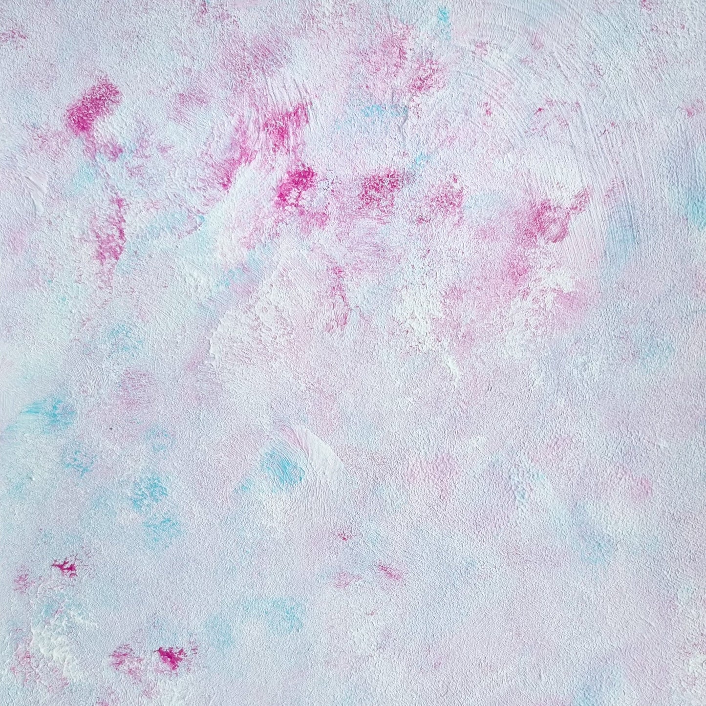 A textured abstract background with a mottled blend of pastel pink, light blue, and off-white tones.