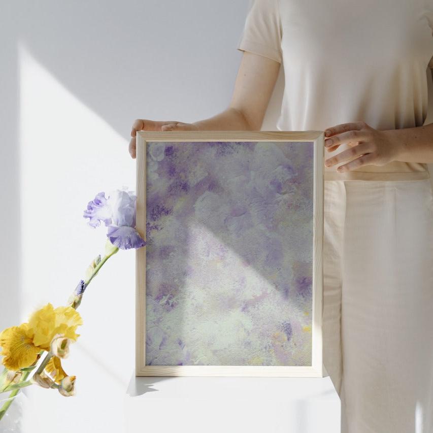 Purple, Feel good one of one-of-a-kind colorful art poster based on original abstract art created by up-and-coming artist Scandinavian Jeanette Haga held by a woman