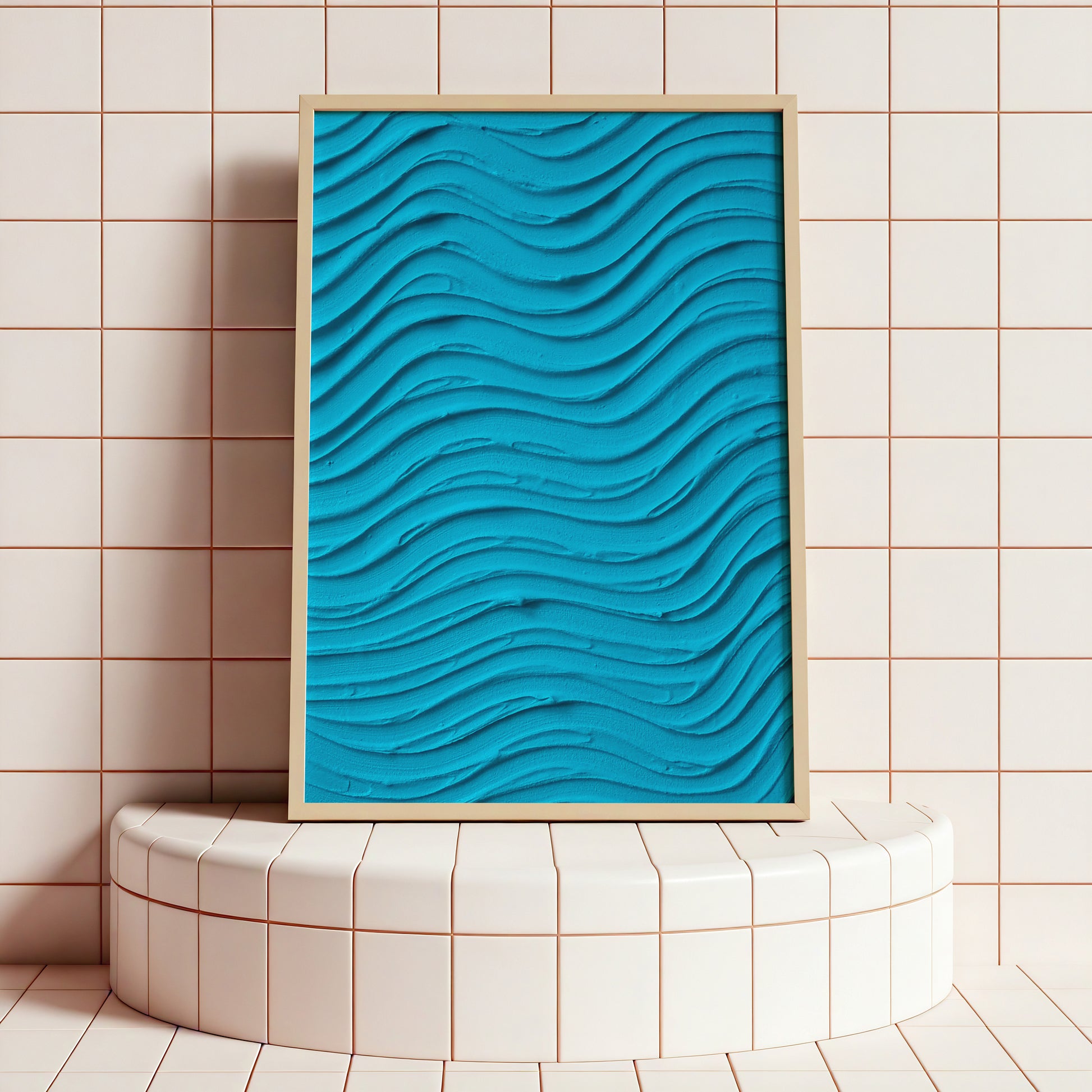 A framed wall art print with a turquoise blue wavy 3D texture design, displayed on a white tiled pedestal against a matching tiled wall.