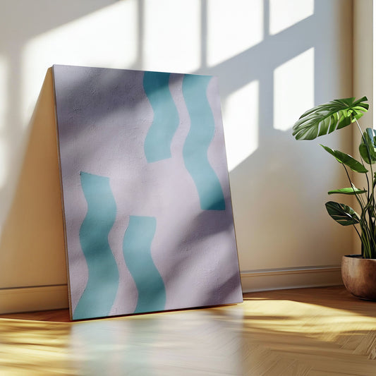 Abstract canvas wall art leaning against a wall in a sunlit room, featuring wavy vertical shapes in light blue and teal on a pale lavender background. A potted green plant stands to the right, with warm sunlight and window shadows cast across the wall and floor.