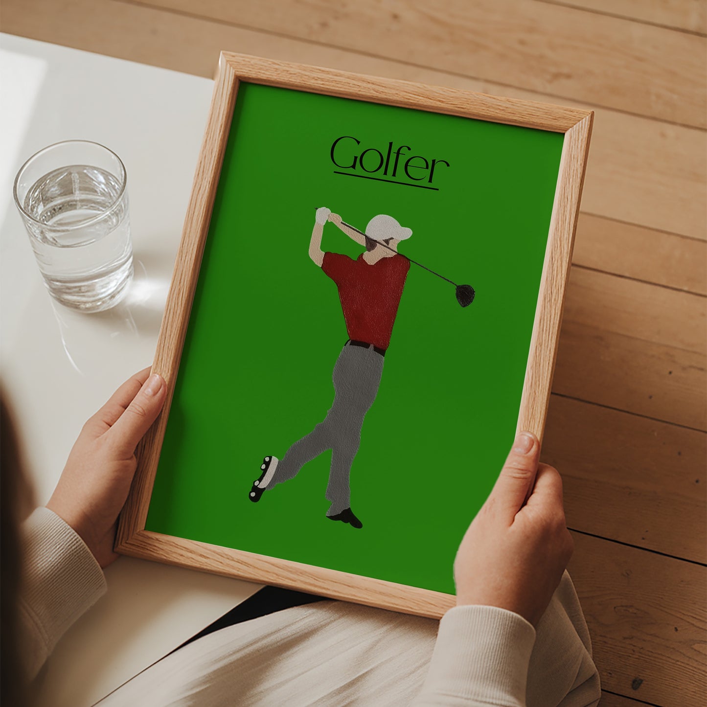 Modern framed Golfer Green artwork styled as bold golf decor — made by Scandinavian up-and-coming artist Jeanette Haga.