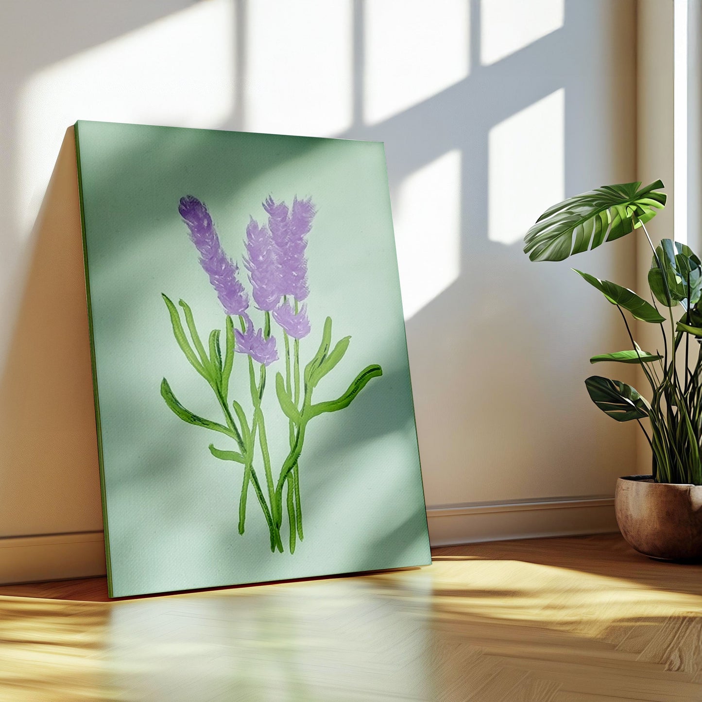 A vertical canvas art print featuring a watercolor-style illustration of purple lavender flowers on a pale green background, leaning against a wall on a wooden floor next to a potted plant.
