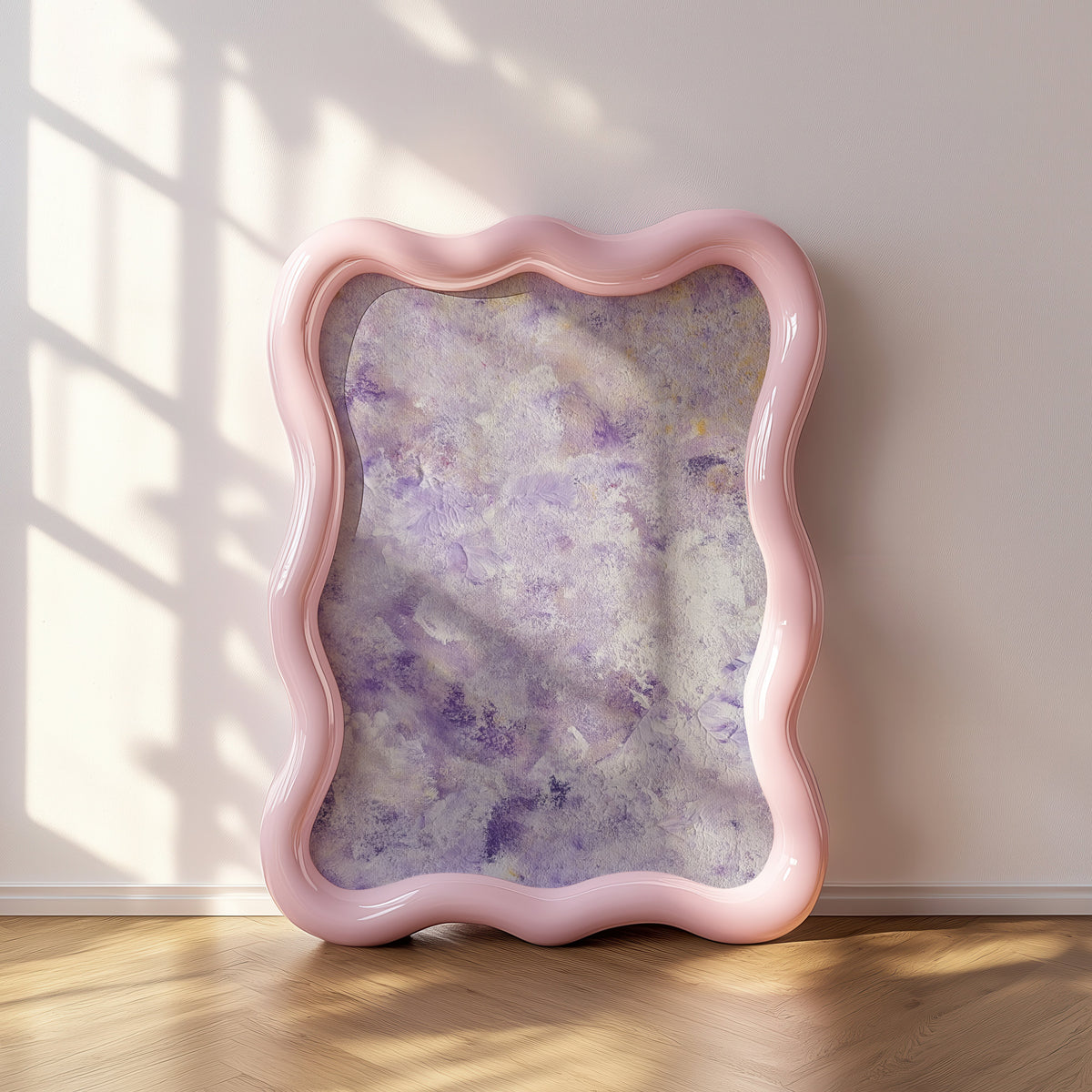 A wavy-edged pink tray or shallow frame with a purple marbled insert, leaning against a light wall on a wood floor with window shadow patterns cast across the scene.