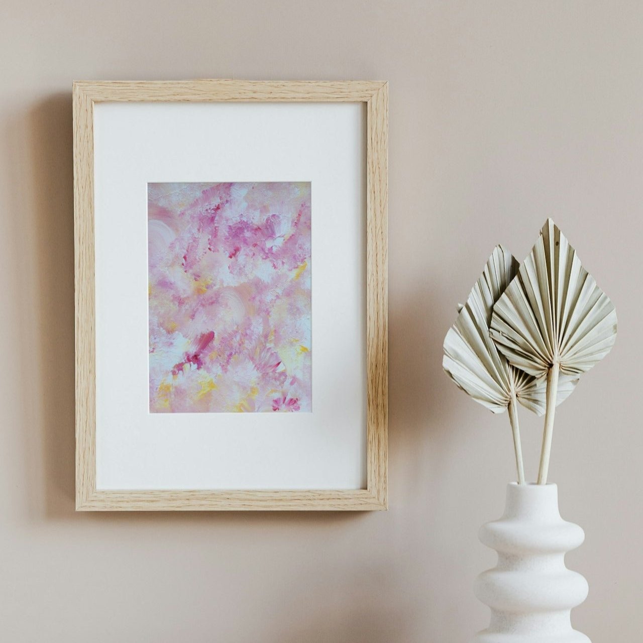 pastelpinkandyellow Feel good one of one-of-a-kind colorful art poster based on original abstract art created by up-and-coming artist Scandinavian Jeanette Haga as decor  in a modern beige home 
